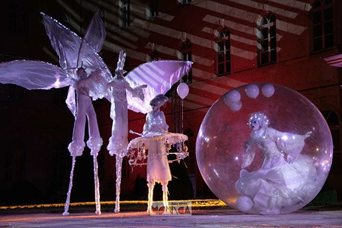 Echassiers blancs lumineux musicaux de Noel