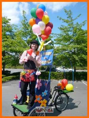 Le triporteur sonorise de l huour magie et ballons