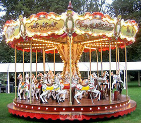 Manege carrousel de fete foraine en location avec chevaux de bois